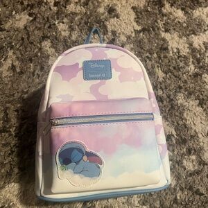 Sleeping Stitch loungefly. Never used. Tags still on.